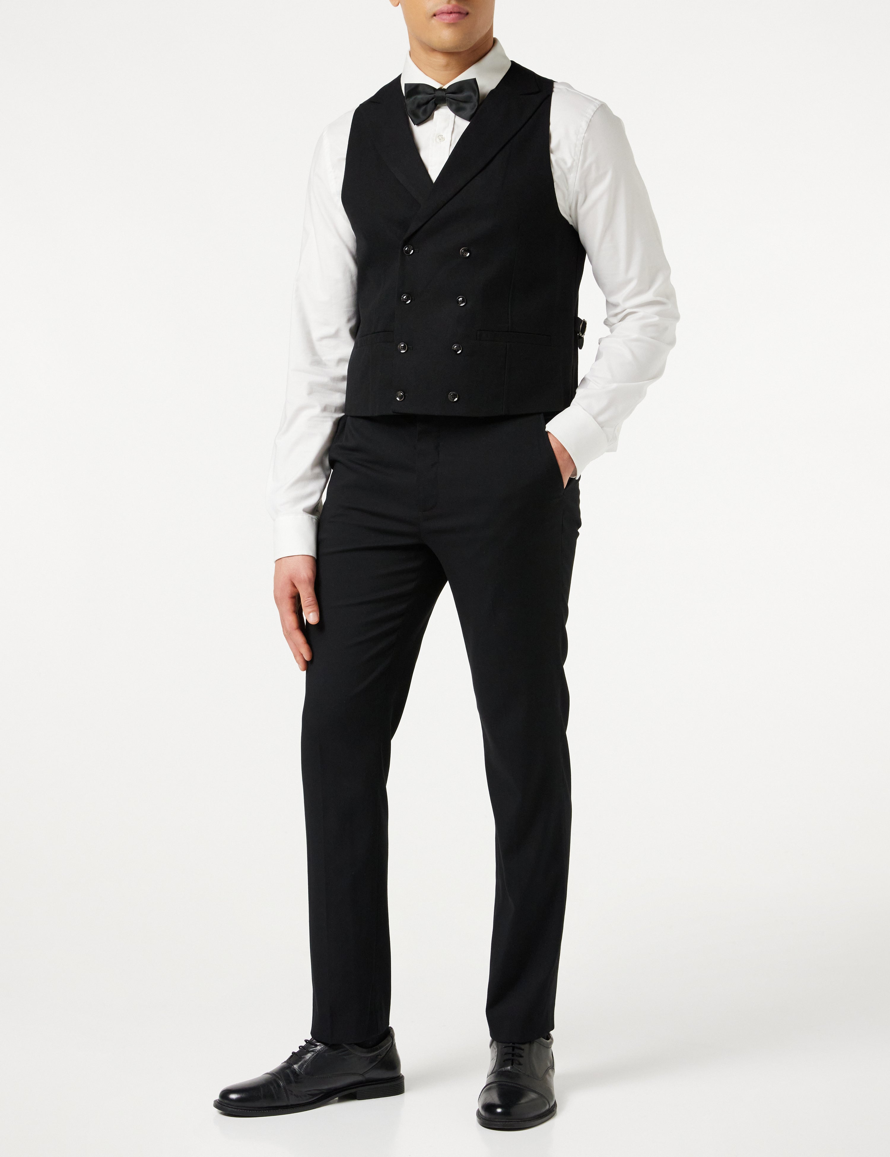 grey blazer black waistcoat black trousers